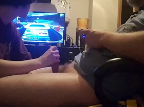 Big hard cock sucked while playing video game