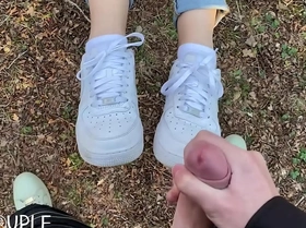 Long tongue gives blowjob in the woods and receive cumshot on her nike air1