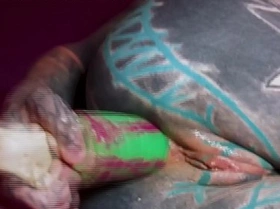 Heavily tattooed dreadgirl plays anal