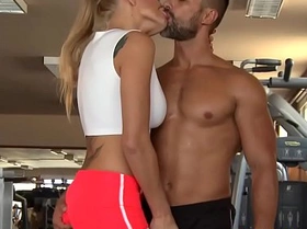 Busty babe anally fucked in gym