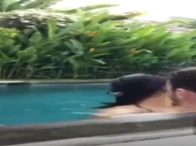 Indonesian fuck in pool during live