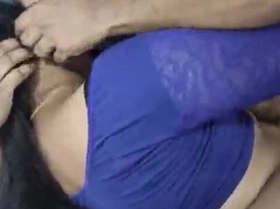 Seductive Indian housewife sneaks passionate encounter with muscular Uber driver, exploring blowjob and doggystyle thrills.