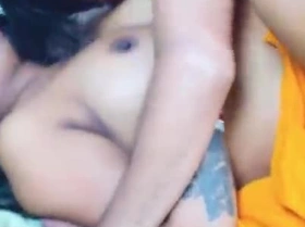 Passionate kitchen encounter with busty Indian Bhabhi enjoying steamy Desi sex while cooking.