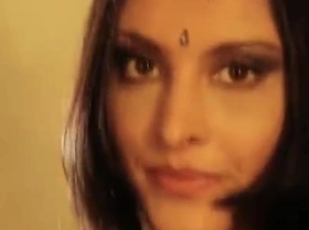 Seductive Indian Girlfriend Teases with a Sultry Striptease, Revealing Her Brunette Curves.