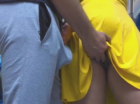 Blonde temptress strokes a stranger\'s throbbing cock on the bustling bus, sparking a wild, public climax.